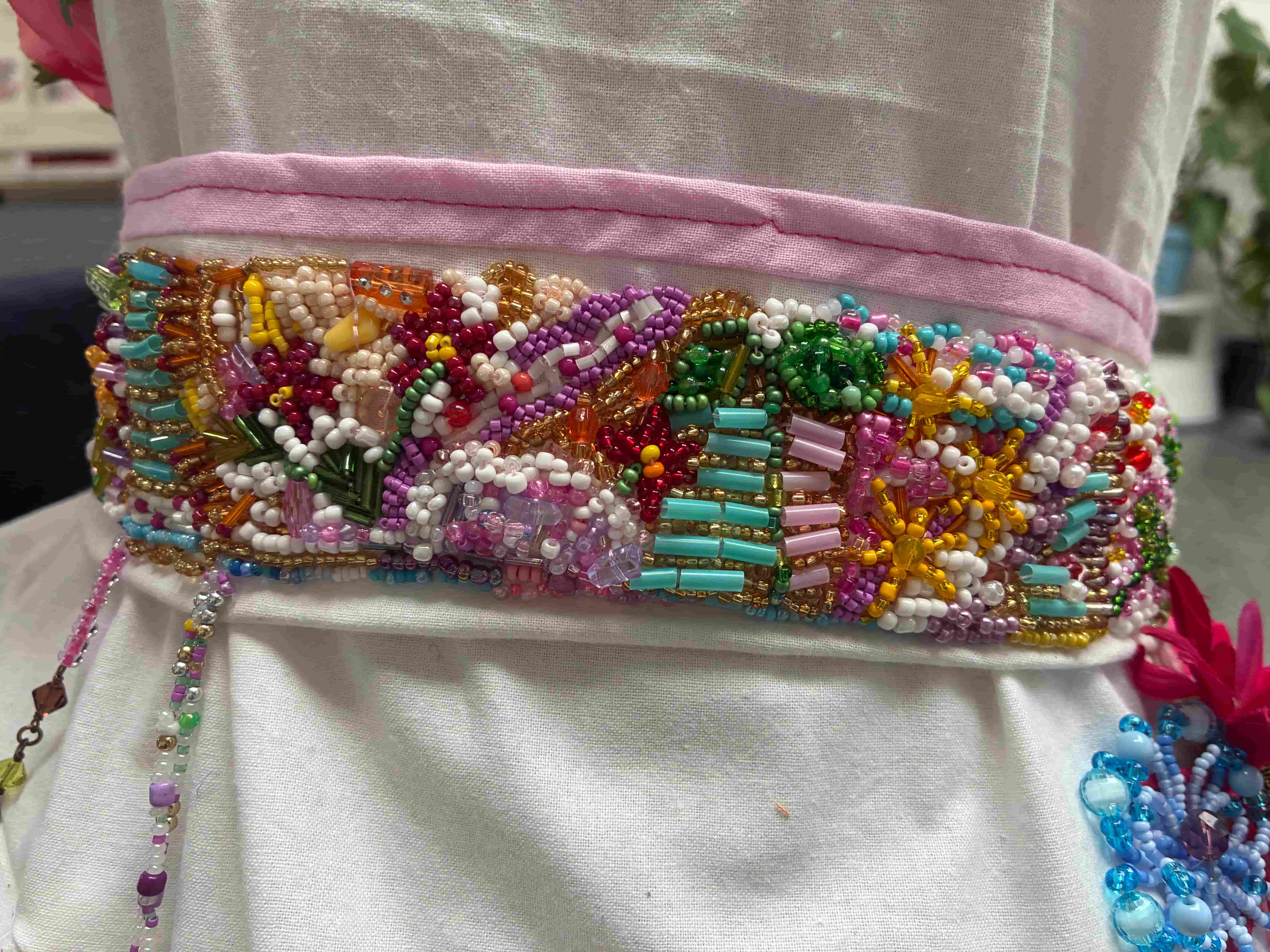 et armbånd med perler